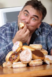 fat_man_eating_doughnuts_photo